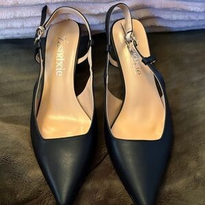 Black Women's Slingback Heels they are marked a 9 1/2 but they fit like a 9